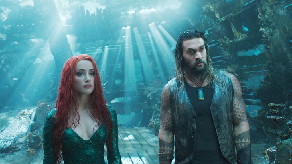 AQUAMAN, from left: Amber Heard as Mera, Jason Momoa as Aquaman, 