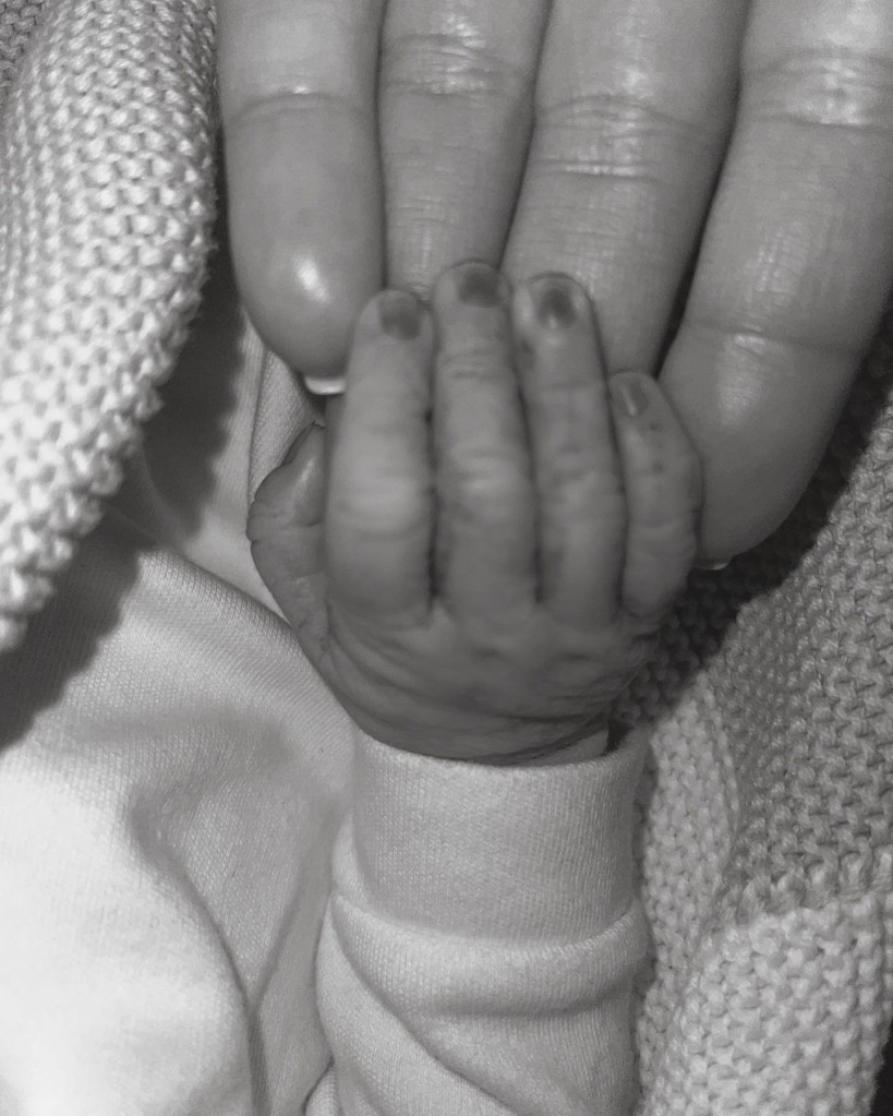Lauren Goodger with baby Lorena's hand