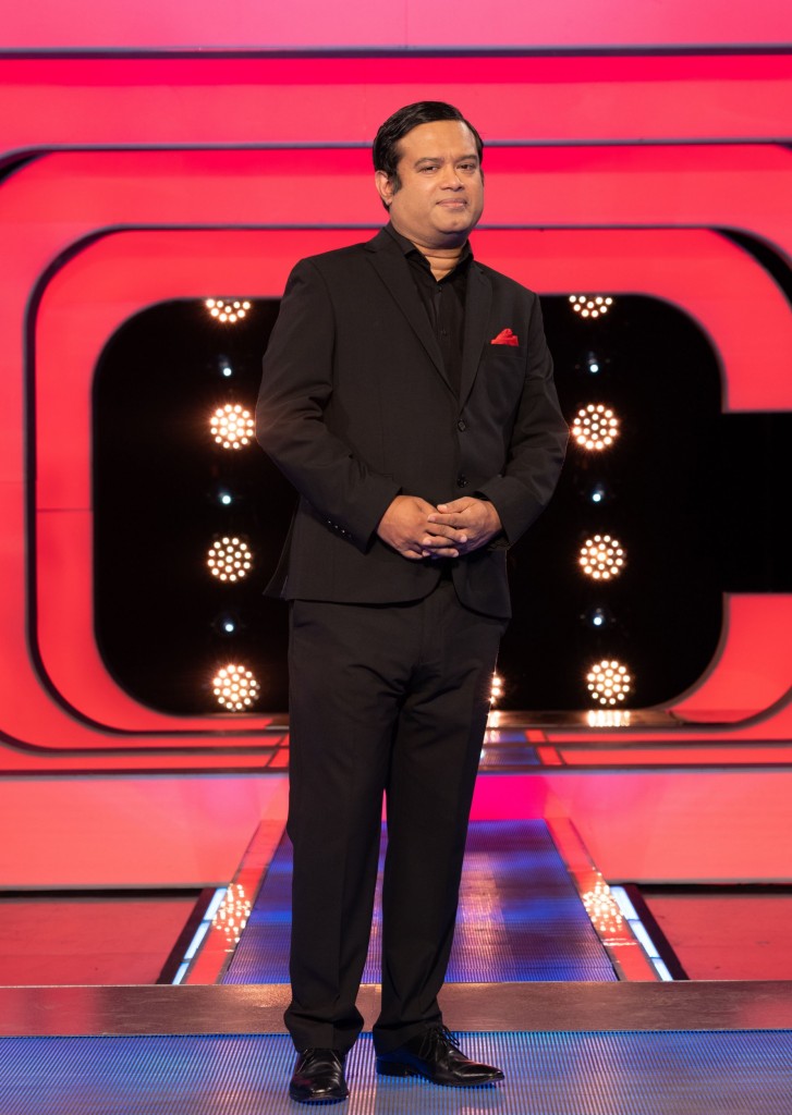 Editorial use only Mandatory Credit: Photo by ITV/REX/Shutterstock (12435960n) Paul Sinha. 'Beat The Chasers' TV Show, Series 4, Episode 1, UK - 11 Sep 2021 Beat The Chasers, is a British ITV quiz show spin-off from the tv series The Chase, hosted by Bradley Walsh in which contestants play against a professional quizzer, the 