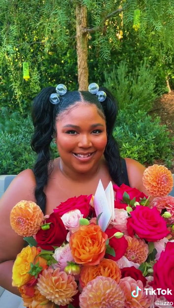 lizzo with flowers