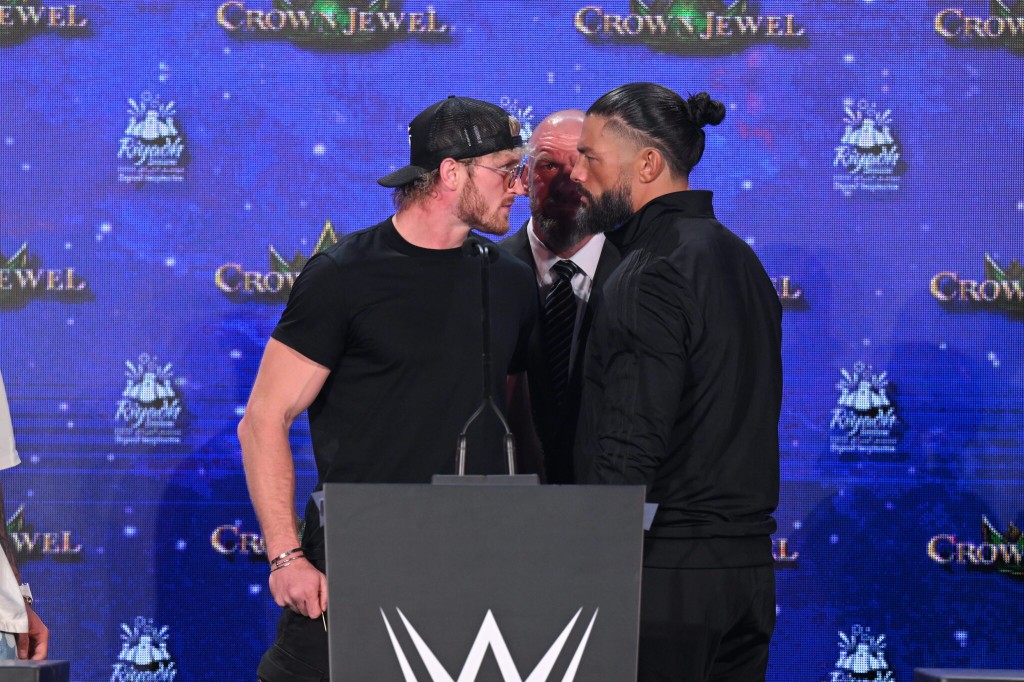 WWE superstars Logan Paul and Roman Reigns face off at the Crown Jewel press conference in Saudi Arabia