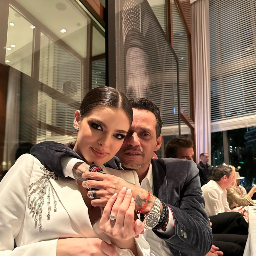 Marc Anthony and wife. 