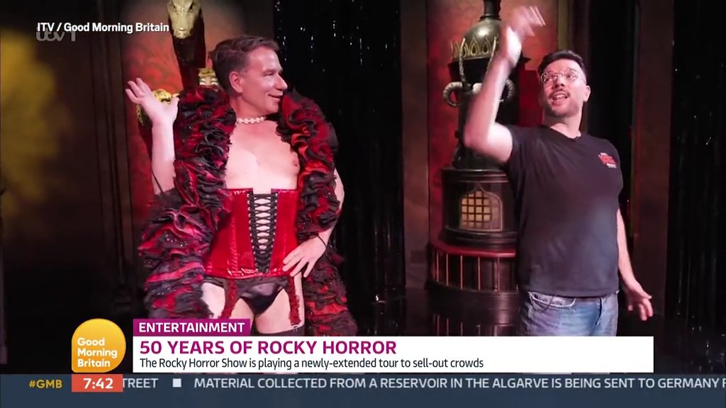 Richard Arnold presents GMB in corset and tiny leather underpants