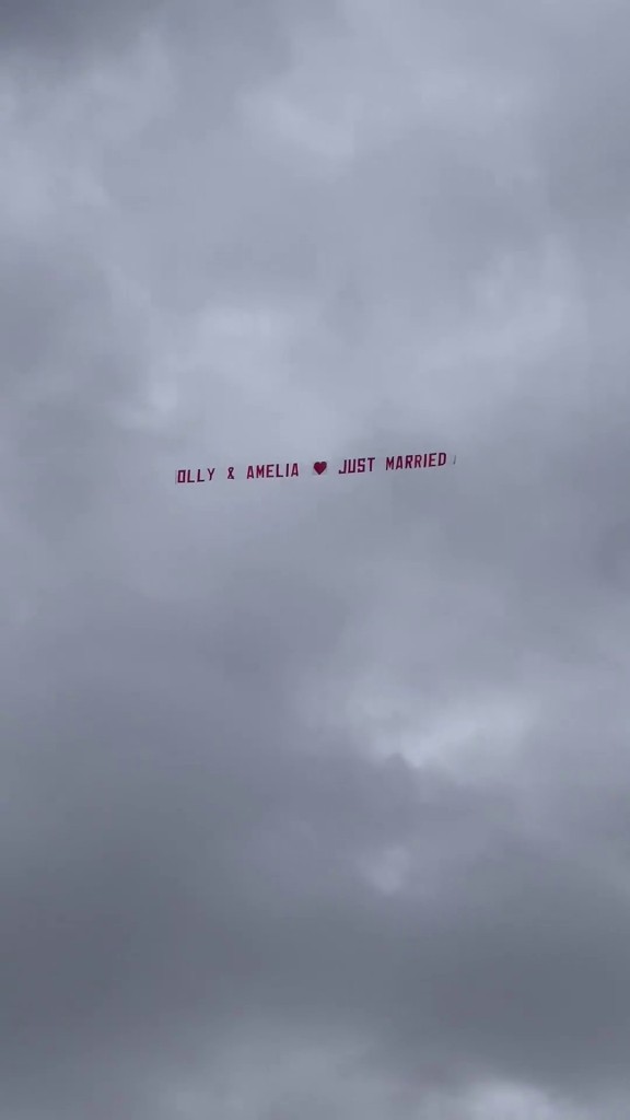 plane in sky with banner