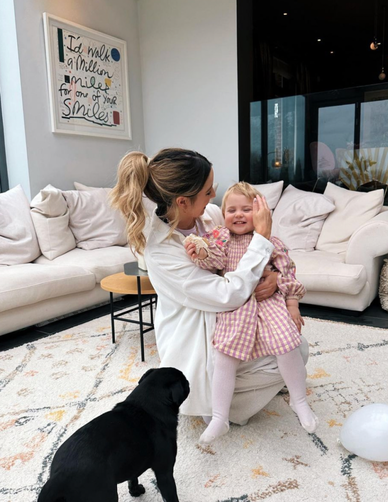 Zoe Sugg with daughter
