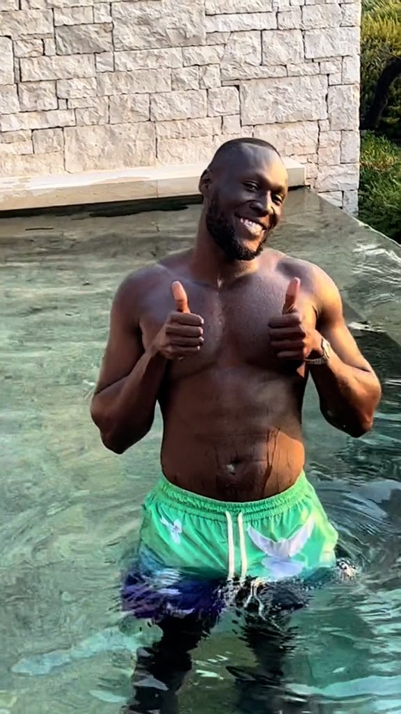 Stormzy in a swimming pool