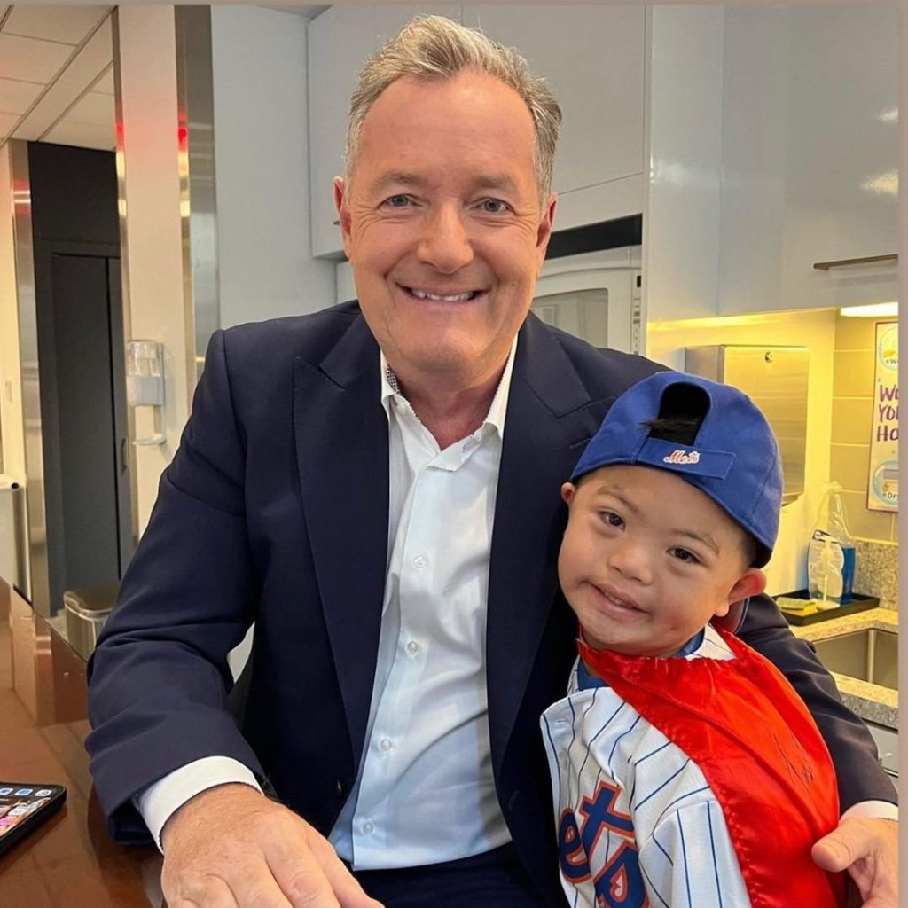 Piers Morgan cuddles abandoned boy in sweet photo and shares his amazing story
