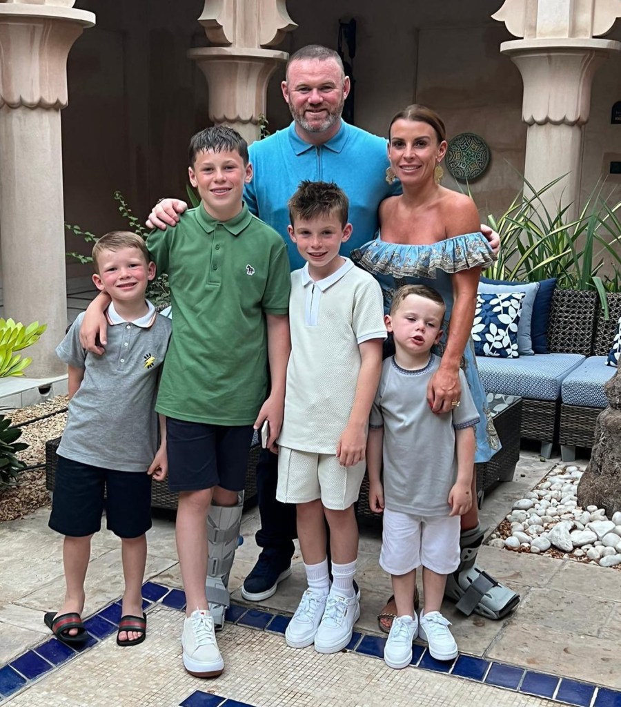 Coleen and Wayne Rooney with their sons