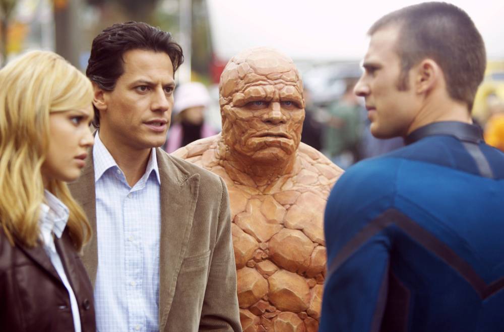 Film 'Fantastic Four' (2005).Starring (L-R): Jessica Alba as Susan Storm/The Invisible Woman, Ioan Gruffudd as Reed Richards/Mr. Fantastic, Michael Chiklis as Ben Grimm/The Thing and Chris Evans as Johnny Storm/The Human Torch. Directed by Tim Story. Writing credits Michael France (written by) Mark Frost (written by). Genre: Action / Sci-Fi / Fantasy / Adventure (more)Plot Outline: A group of astronauts gain superpowers after a cosmic radiation exposure and must use them to oppose the plans of their enemy, Doctor Victor Von Doom. Invisible Woman Jessica Alba (L), Mr Fantastic Ioan Gruffudd (2nd L), The Thing Michael Chiklis (2nd R) and Human Torch Chris Evans (R) react to their new-found powers in this undated publicity photo from Twentieth Century Fox's 