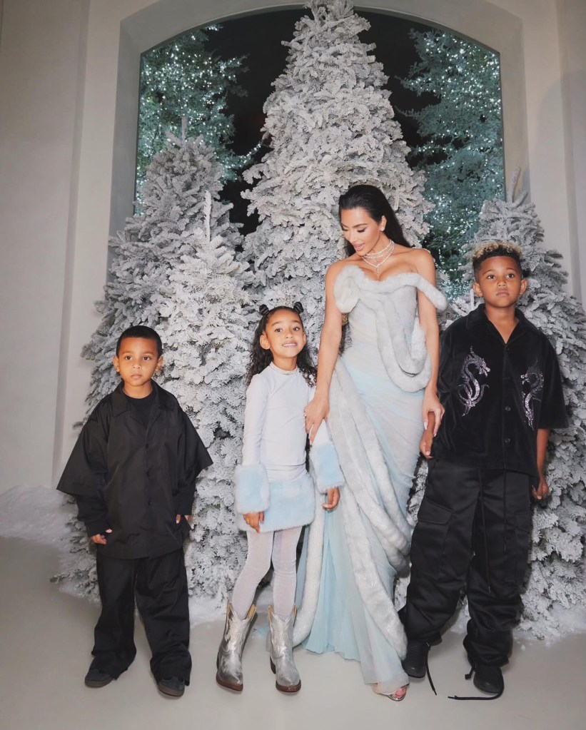 Kim Kardashian with Chicago, Saint and Psalm at Christmas party 2023