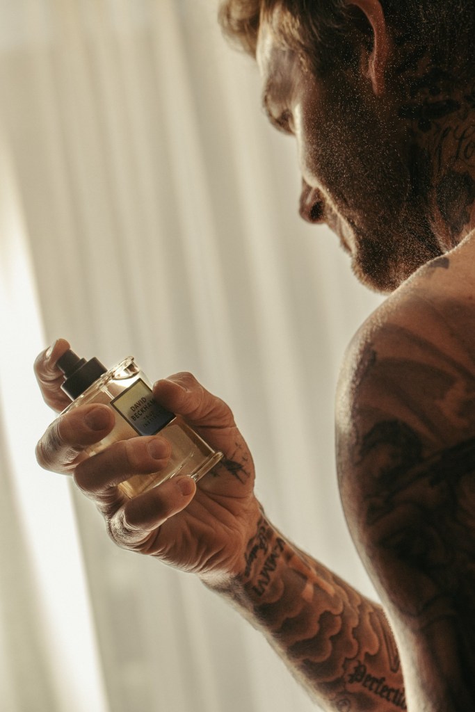 David Beckham in a photoshoot with his aftershave.
