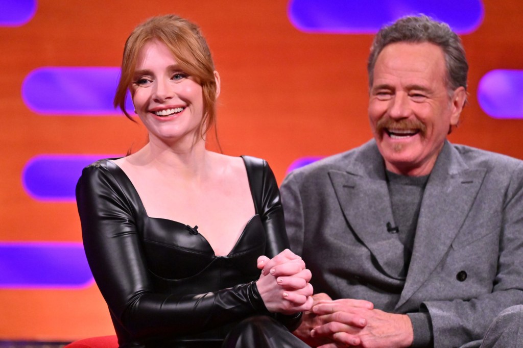 EDITORIAL USE ONLY Bryce Dallas Howard and Bryan Cranston during the filming for the Graham Norton Show at BBC Studioworks 6 Television Centre, Wood Lane, London, to be aired on BBC One on Friday evening. Picture date: Thursday January 25th, 2024. Photo credit: Matt Crossick/PA Wire