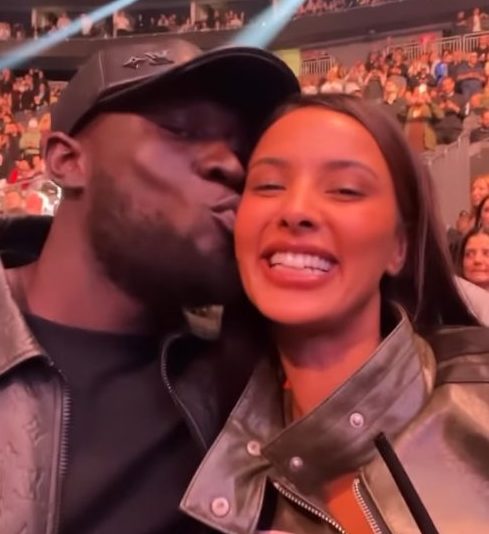 Maya Jama licks boyfriend Stormzy's face before he kisses her back in loved-up clip while watching a UFC fight together in Las Vegas