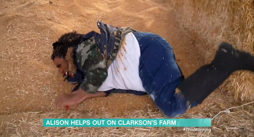 Alison Hammond rolling in the hay.