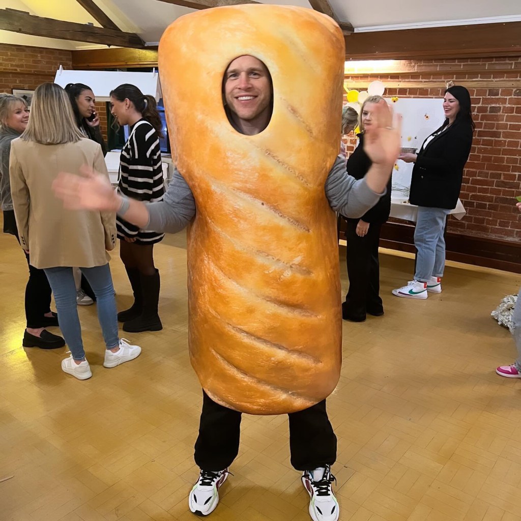 Olly Murs in sausage roll costume at baby shower