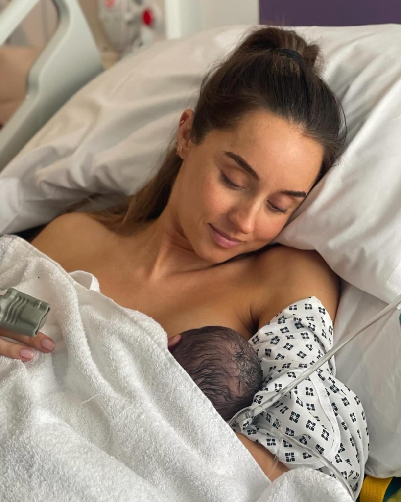 Emily Andre holding her newborn daughter
