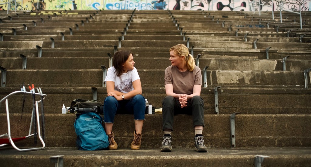 This image released by A24 shows Cailee Spaeny, left, and Kirsten Dunst in a scene from 
